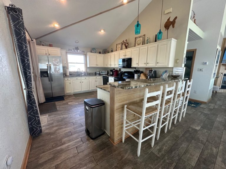 Kitchen with access to covered porch