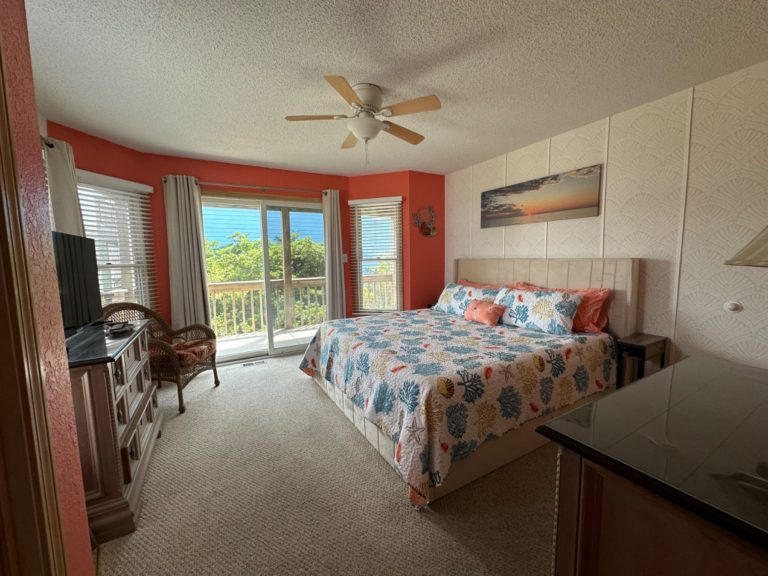 Mid-level King with deck access and ensuite